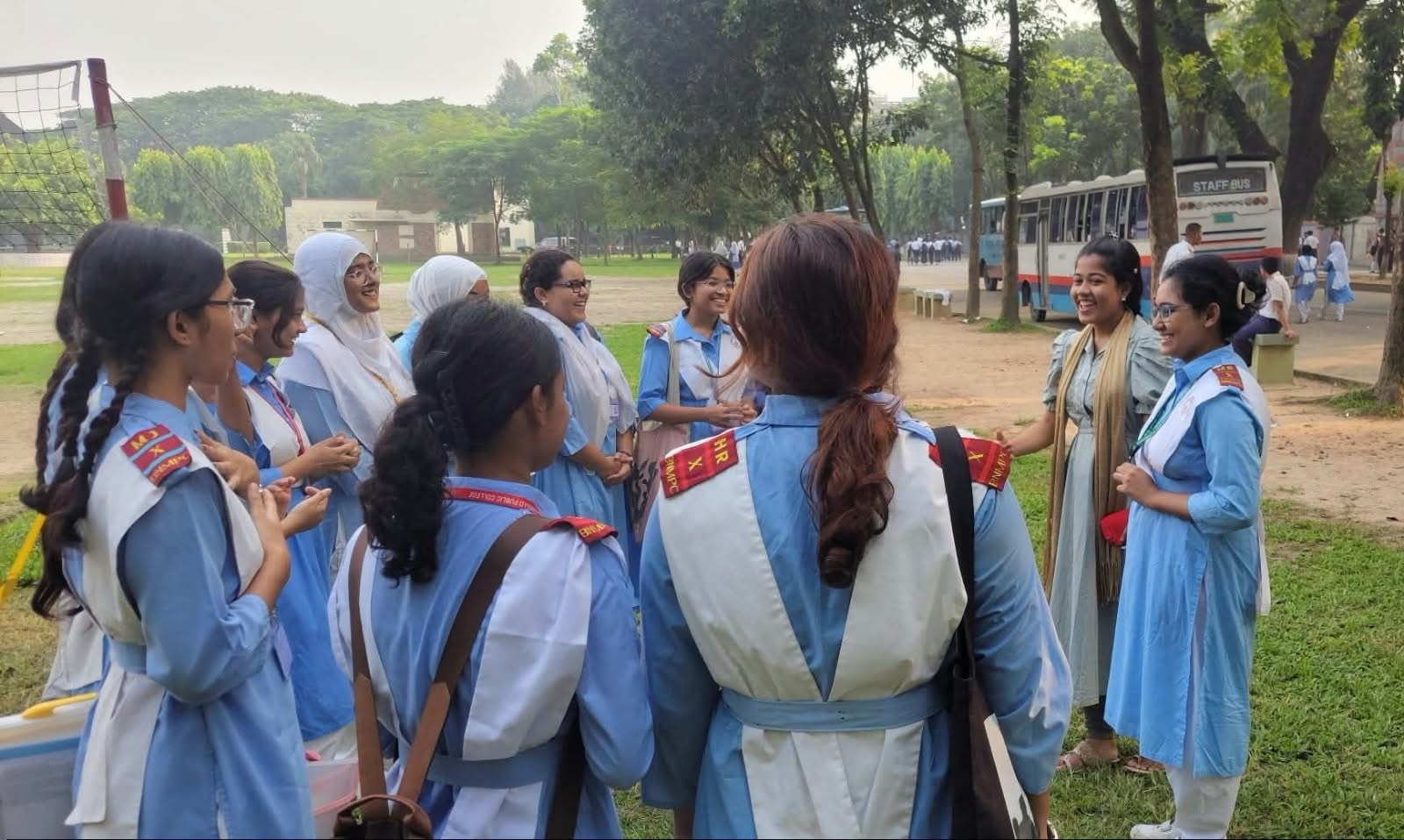 Girls and women taking part in a group conversation